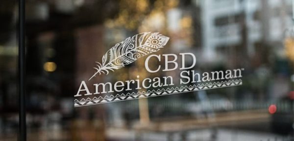 CBD American Shaman logo on glass